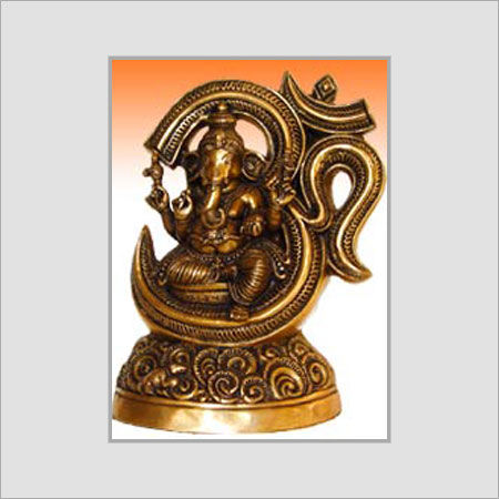 Ganesh Seated Under Om Statue