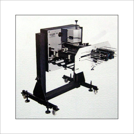 AUTOMATIC PAPER CUTTING MACHINE