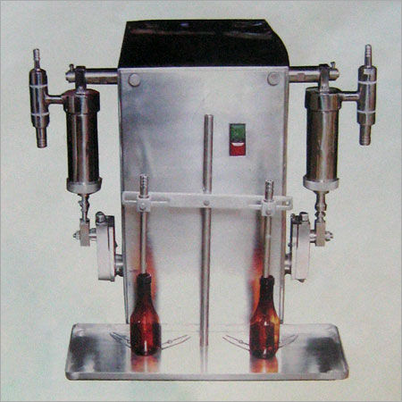 VOLUMETRIC LIQUID FILLING MACHINE