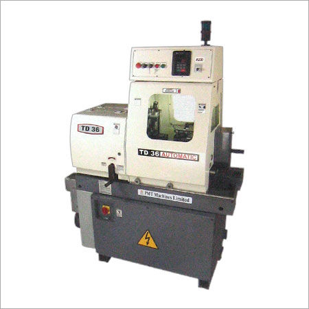 AUTOMATIC LATHE MACHINE