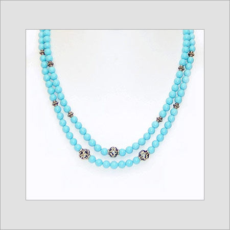 Hot Turquoise Strung with Silver Beads