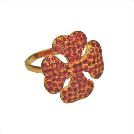 GOLD RING WITH STUDDED RUBY