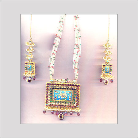 Designer Gemstone Necklace Set In Gold 