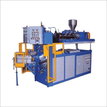 CONTINUOUS EXTRUSION TYPE MOULDING MACHINE