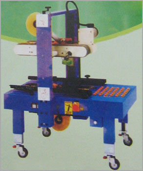 CARTON SEALING MACHINE