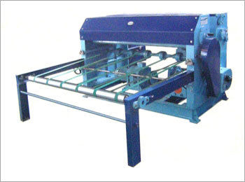 REEL SHEETING MACHINE