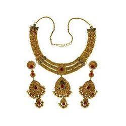 Gold Antique, Ruby And White Polki Necklace Set.