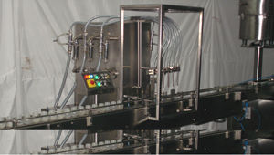 Automatic Liquid Bottle Filling Machine - Volumetric Principle
