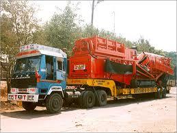Heavy Equipment Transportation Services By Saffron Carriers