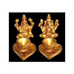 Ganesh And Laxmi Sitting On Leaf Statue