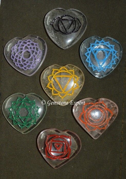 Engraved Chakra Oval Set On Crystal Quartz