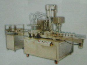 Fully Automatic Four Head Bottle Filling And Capping Machine With Turn Table