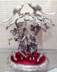 White Metal Radha Krishna Statue Under Tree With Peacocks