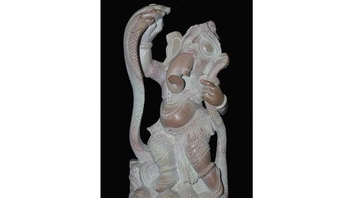 गणेश प्लेइंग विद स्नेक स्टैच्यू