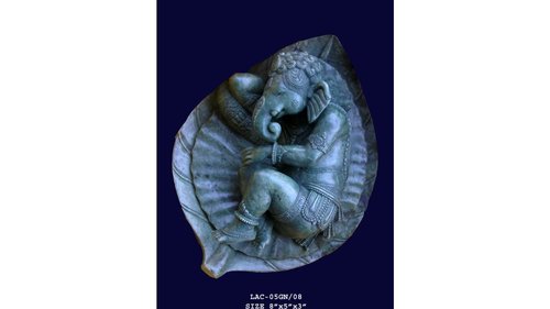 Ganesha Sleeping On Leaf Statue