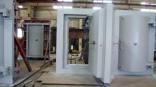 Machine Enclosure With Vertical Lift Doors