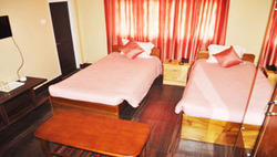 Super Deluxe Rooms Services By HOTEL RANG INN