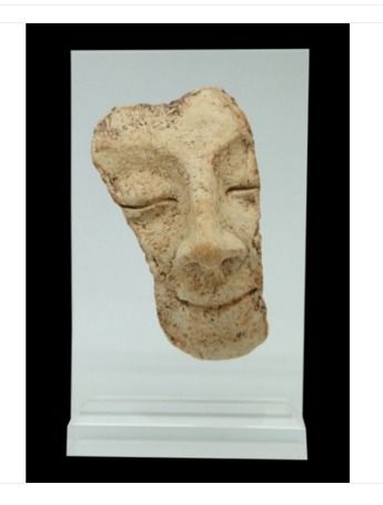 Carefree Youth Face Sculpture