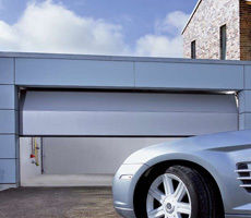 Sectional Garage Door - Durable Steel Structure | Outstanding Bolting System, Easy Operation, Complete Security Protection