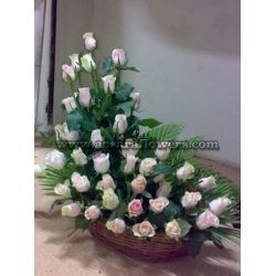 White Roses In Big Basket