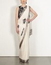 मोटिफ्स और टिशू बॉर्डर के साथ आइवरी साड़ी