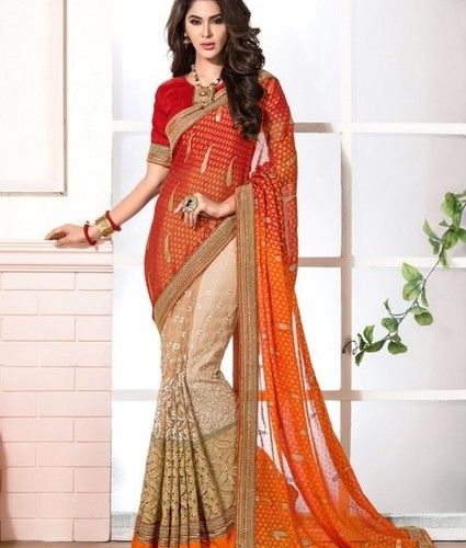 Amazing Orange Colored Brasso and Net Saree