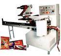 Flow Wrap Machine ( F W M )