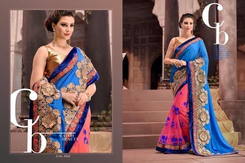 ब्राइडल एम्ब्रोडरी के साथ रानी और जर्मन एम्ब्रॉयडरी की हुई साड़ी