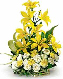 Lillium And Roses Arranged In A Basket