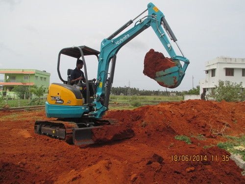 Cream Kubota Mini Excavator