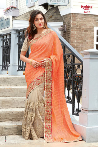 Designer Sarees - Georgette, Orange and Cream Color with Fancy Border | Bollywood Style, Embroidered Pattern, Lightweight, All-Season Wear, Stone Work