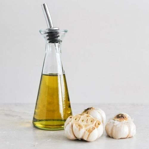 Garlic Oleoresin - Extracted from Allium Sativum Bulbs, 0.06% to 0.1% Volatile Oil Content, Rich in Allicin and Disulphides, Powerful Flavoring Agent