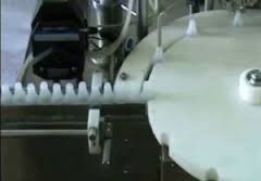 Eyedrop And Eardrop Filling Plugging And Capping Machine