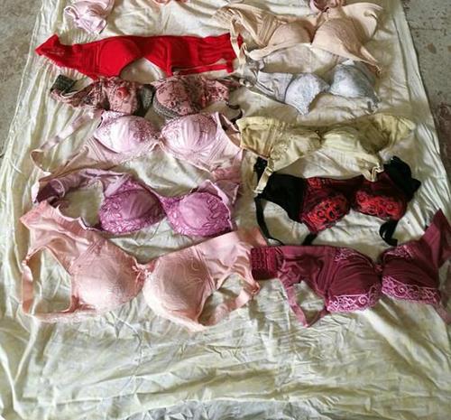 Various kind of used bras on display for sale at second hand