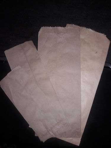 Brown And White Paper Pouch (Grocery Bags)