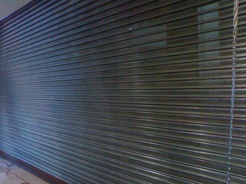 Perforated Rolling Shutter - Durable Metal Build, Custom Sizes Available, Ideal for Windows and Versatile Retrofits