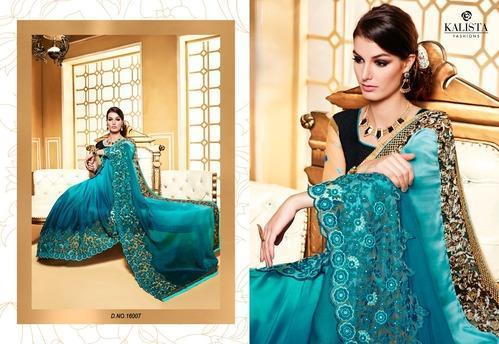 Borderless Turquoise Screen Printed Italian Crepe Saree features blue rose  flowers all over the saree