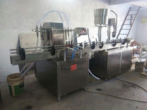 Bottle Filling And Sealing Machine