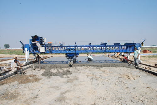 Concrete Paver And Vibratory Truss Screed