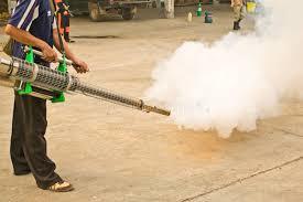 Man Fogging Chemical To Anti Mosquitos