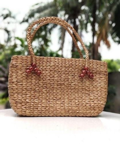 Ecoluxe Pearl Handwoven from durable water hyacinth fibers, this bag  embodies the essence of eco-luxury. The natural texture of water… |  Instagram