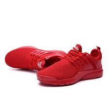 red colour sports shoes
