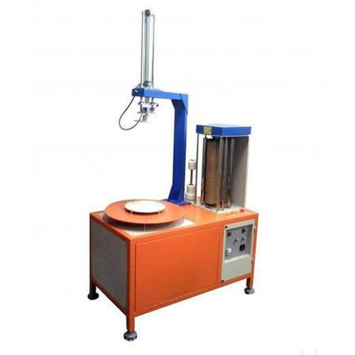 Stretch Wrapping Machine With Pneumatic Arm