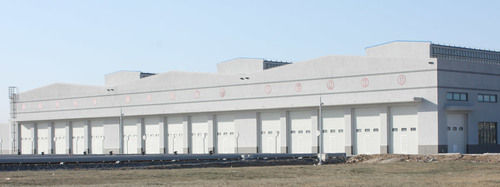 Grey Sectional White Garage Door