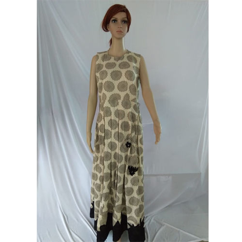 Sleeveless Floor Length Kurti With Net Applique Work And Tassels