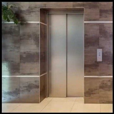 Low Power Consuming Automatic Elevator