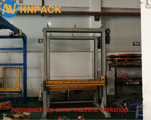 Hennopack On Line Pallet Top Sheet Dispenser Cover Wrapper Machine