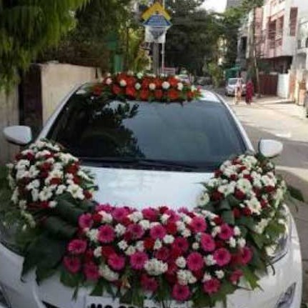https://tiimg.tistatic.com/fp/1/005/655/wedding-car-decorations-services-with-flower-267.jpg