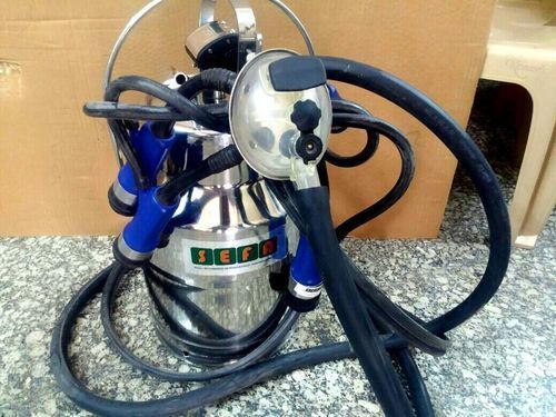 Silver Milking Machine