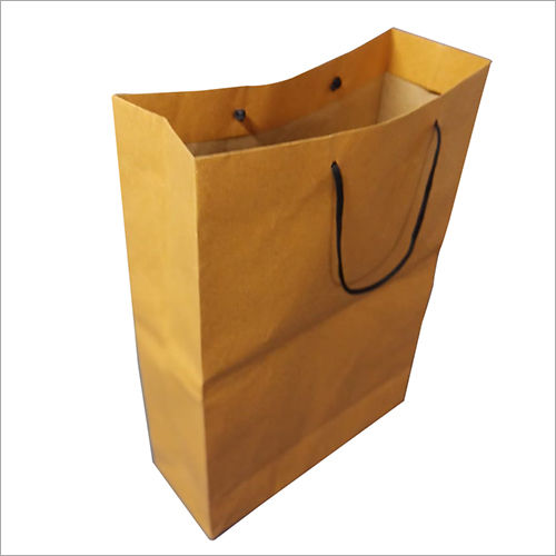 Packaging Paper Bag - Kraft Paper, Available in All Sizes, Brown Color, Hand Length Handle, Customizable Designs and Logos | Durable, Lightweight, Versatile for Heavy Items